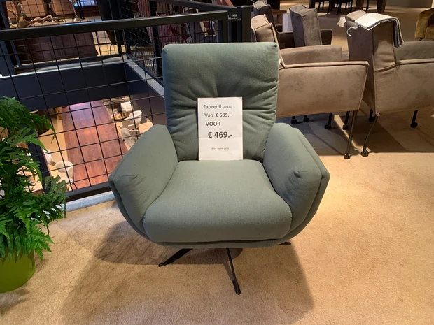 Draaifauteuil in stof, groen